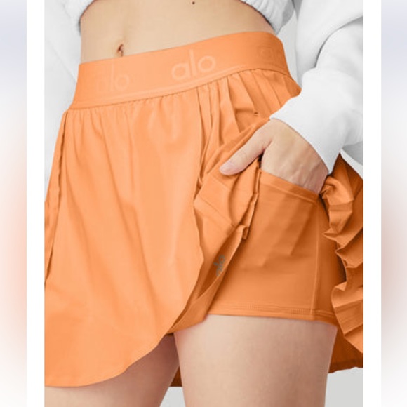 ALO ✨ NWT TENNIS SKIRT IN CANTELOPE - Picture 1 of 12